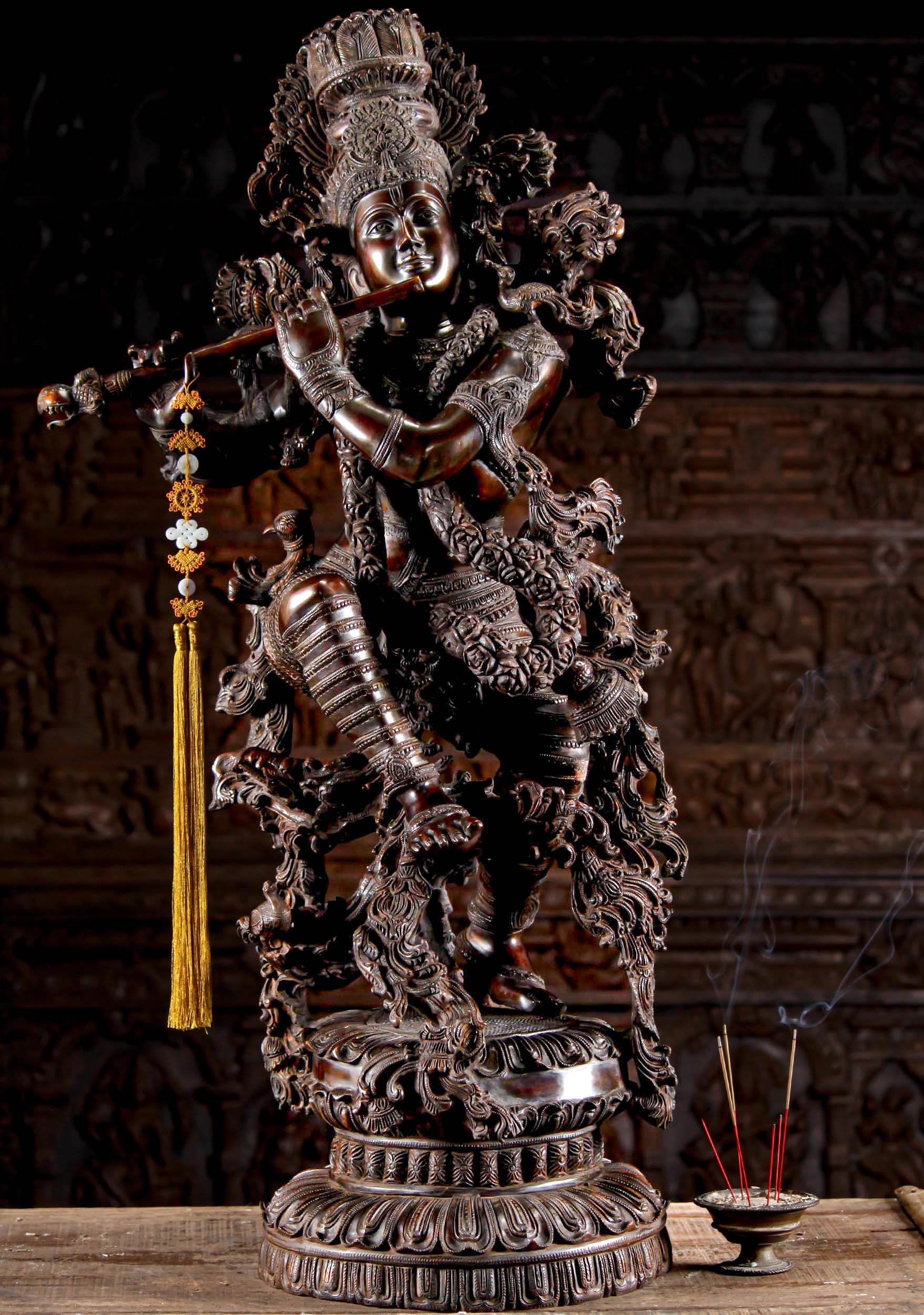 High Quality Brass Gopal Krishna Statue Dancing Ecstatically while Playing Flute with Peacock 43" Questions & Answers