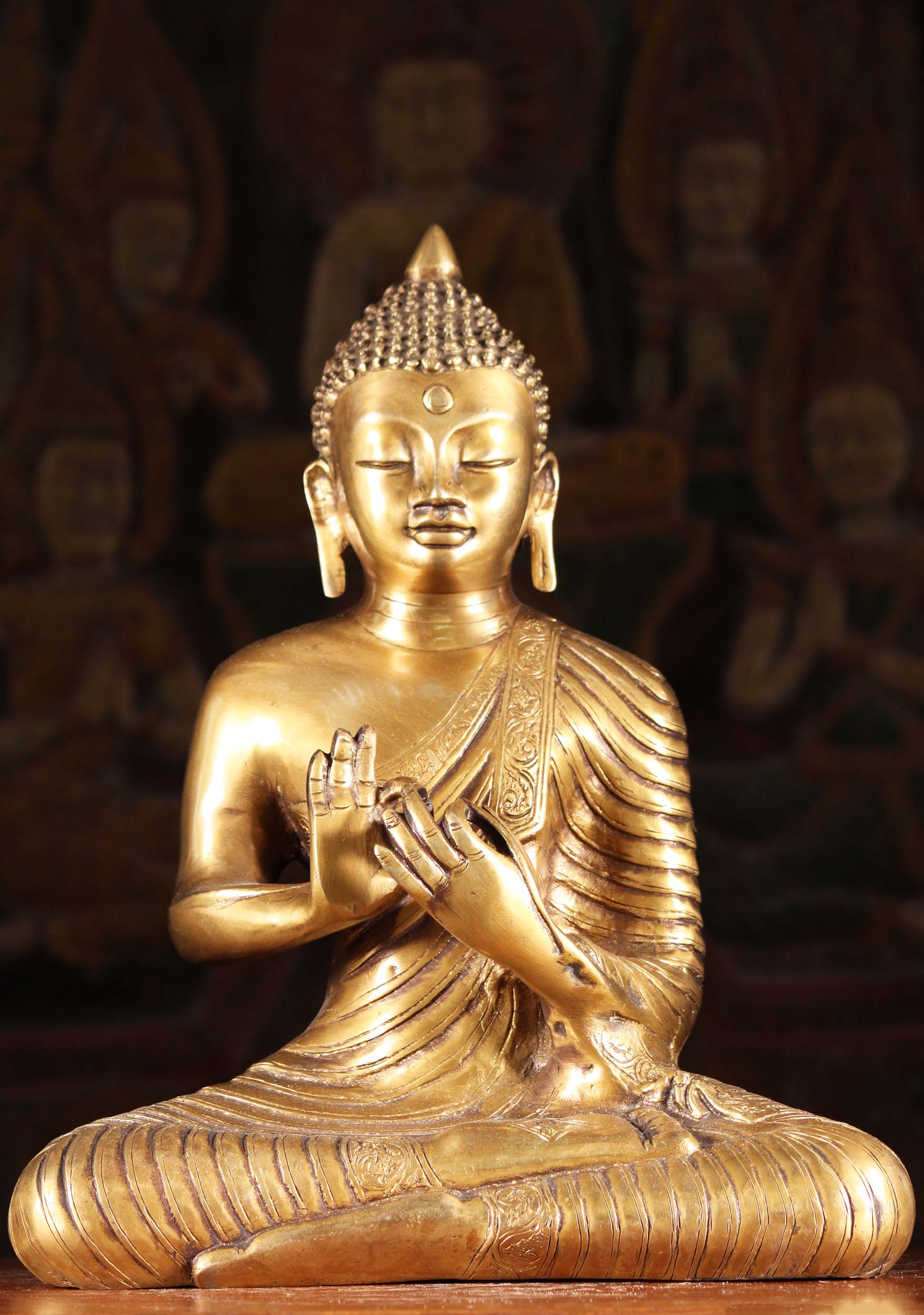 Buddha Brass Indian Style Statue with Hands in front of Chest in Dharmachakra Mudra 14" Questions & Answers