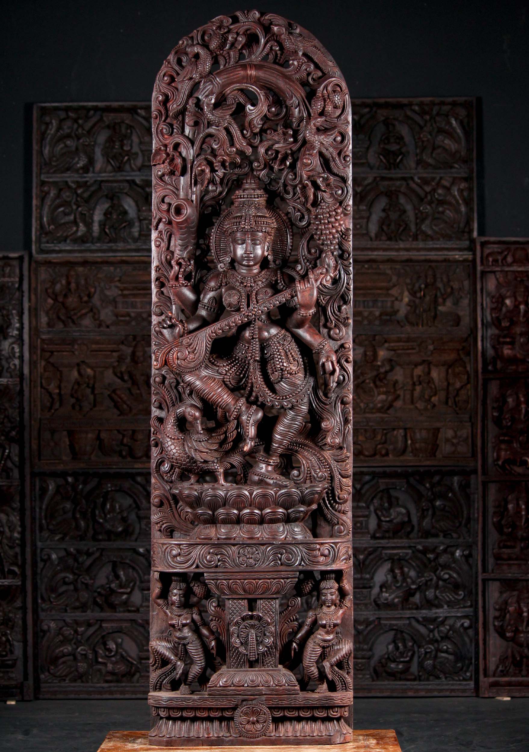 Large 6 Foot Wooden Saraswati Sculpture Playing the Veena Under Lush Canopy 72" Questions & Answers