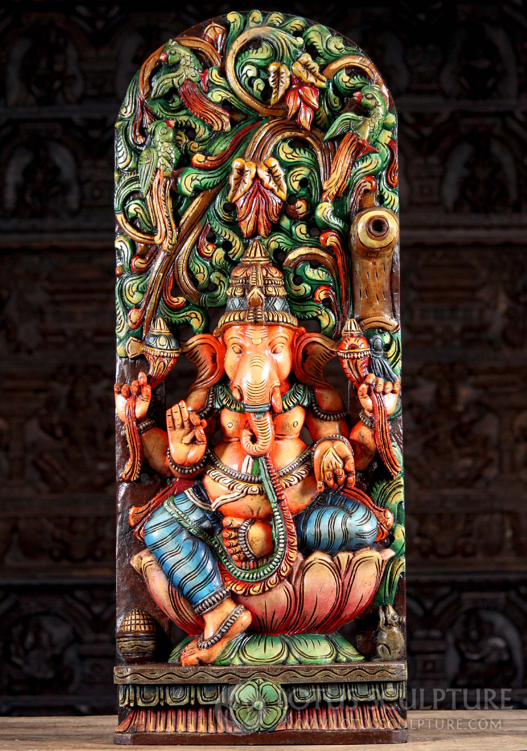 SOLD Painted Wood Seated Hindu God Ganesh Sculpture Under Lush Canopy with Parrots 36" Questions & Answers